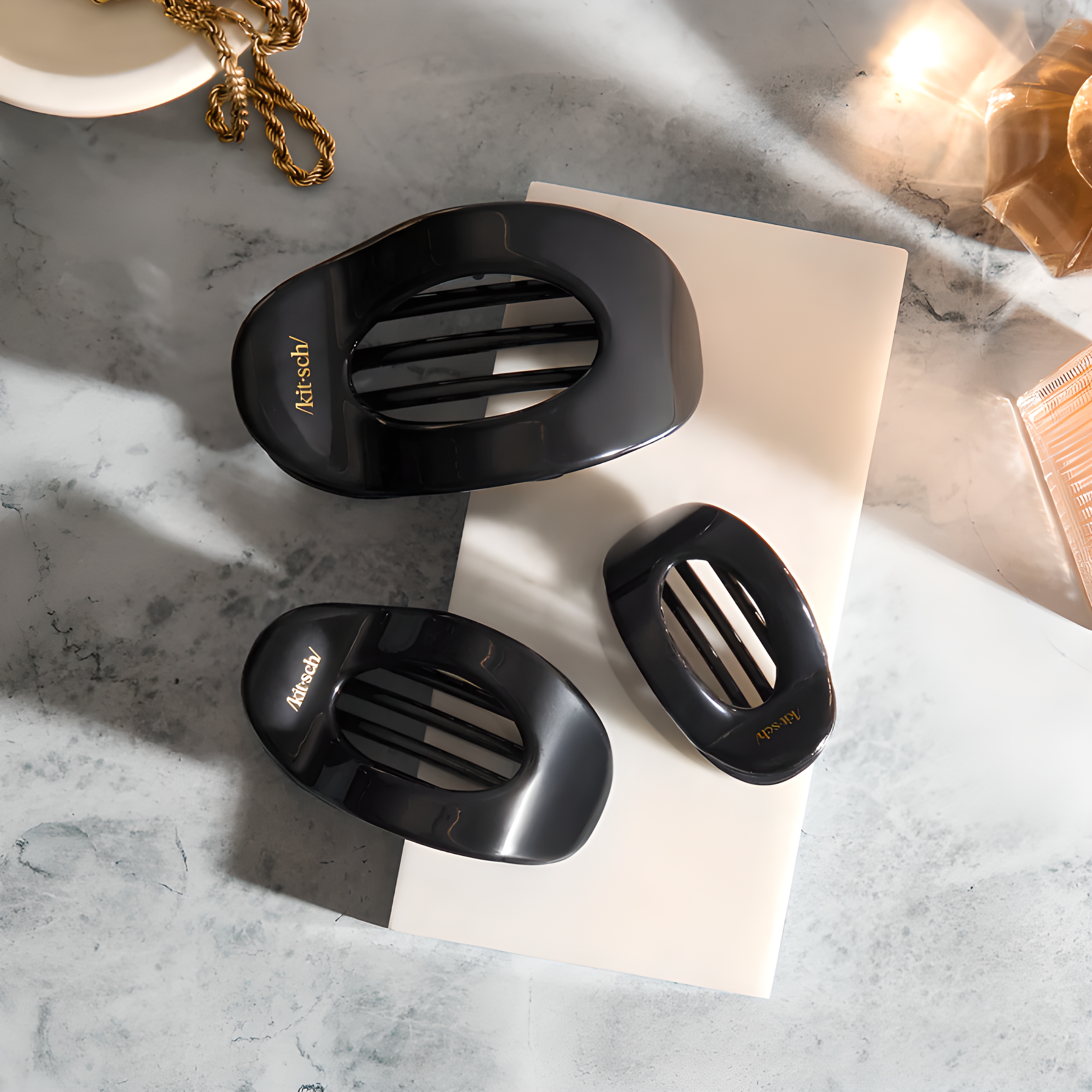 kitsch claw clip styled on curly brown hair