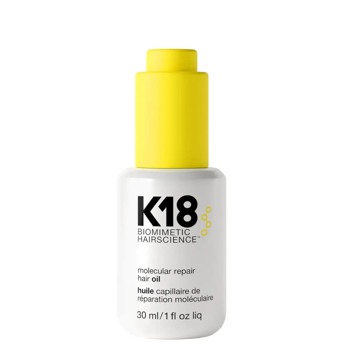 A bottle of K18 Molecular Repair Hair Oil with a white label and yellow cap.