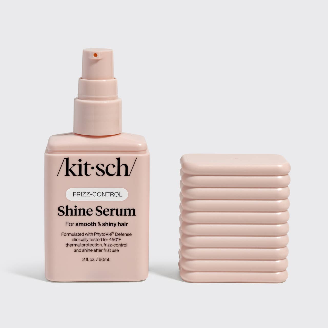 Kitsch Shine Serum bottle with packaging on a light gray background