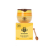 Honey lip balm with packaging and a wooden applicator on a white background