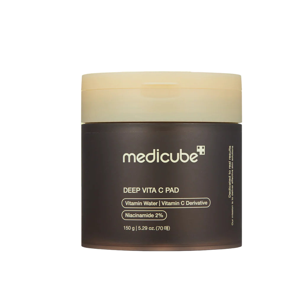 Medicube Deep Vita C Pad with a brown jar on a white background