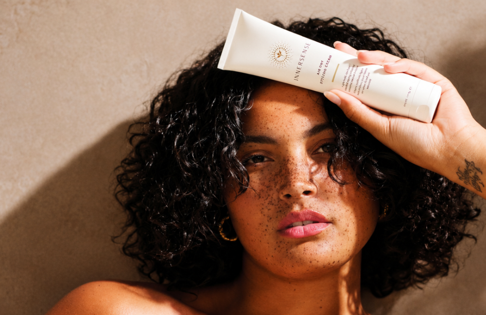 innersense air dry cream on curly hair with natural background