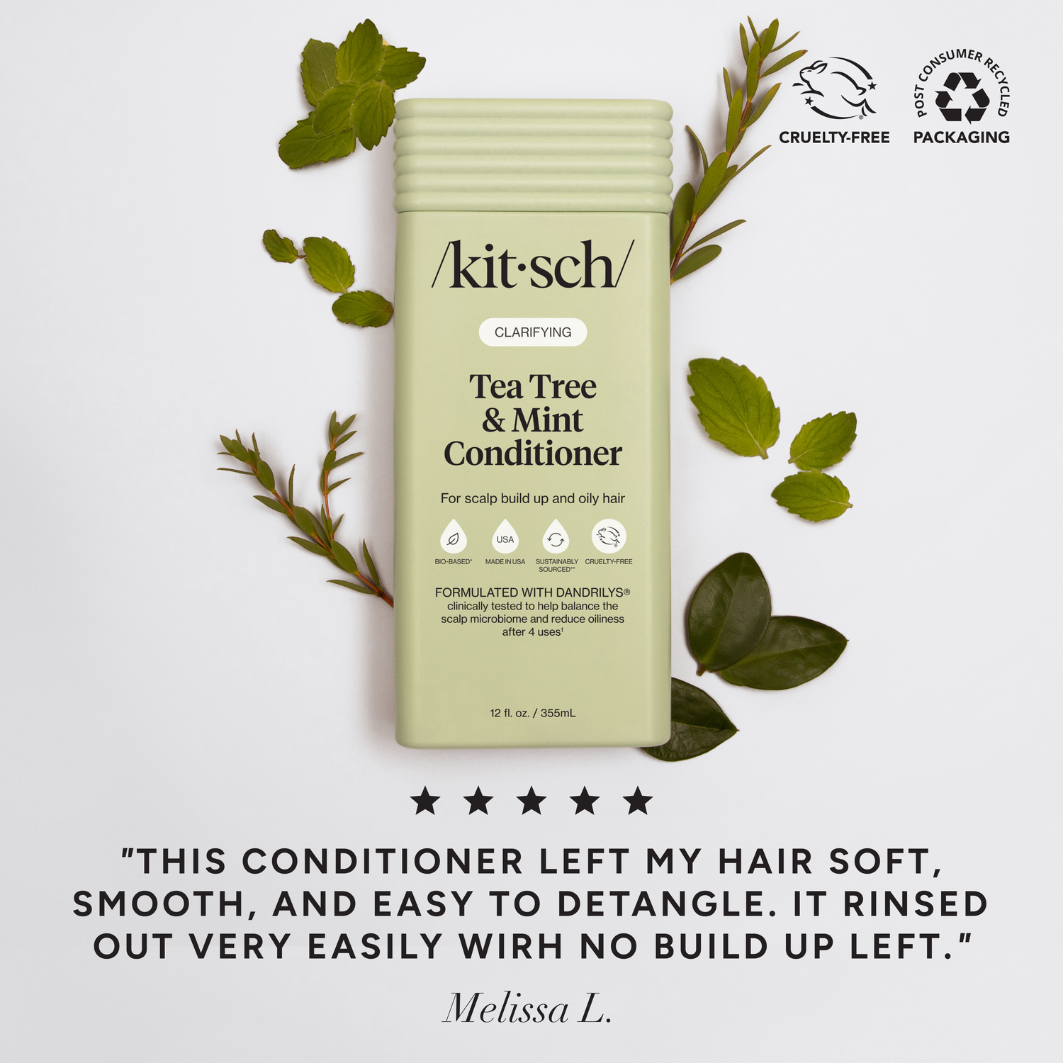 Kitsch Tea Tree &amp; Mint Conditioner packaging with green leaves on a white background