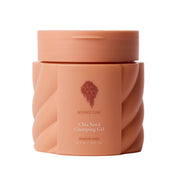 Bounce Cure Chia Seed Clumping Gel in a textured, faceted peach-colored jar with a matching lid, set against a clean light gray background.
