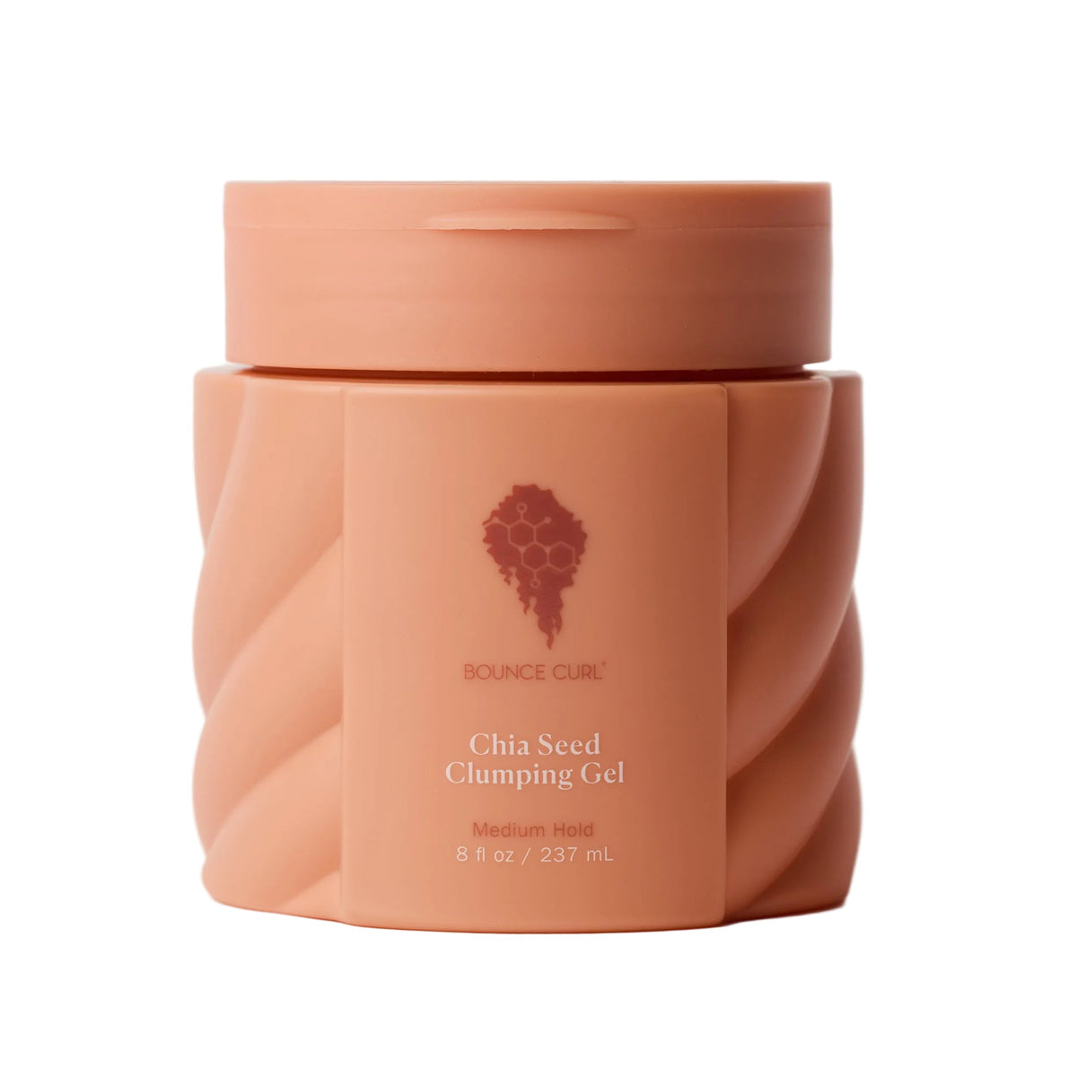 Bounce Cure Chia Seed Clumping Gel in a textured, faceted peach-colored jar with a matching lid, set against a clean light gray background.