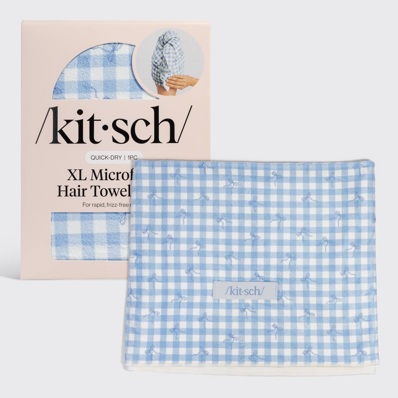 /kit·sch/ XL Microfiber Hair Towel in a light blue and white gingham pattern, shown next to its light pink packaging box.