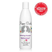 A bottle of Rizos Curls Hydrating Shampoo with a graphic design showing curls and natural elements. The label indicates that the product is hydrating, sulfates-free, silicones-free, parabens-free, and cruelty-free.