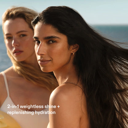 Models with smooth, glossy, hydrated hair showcasing the weightless shine and nourishment of Olaplex No.7 Shine Serum Oil Mist.