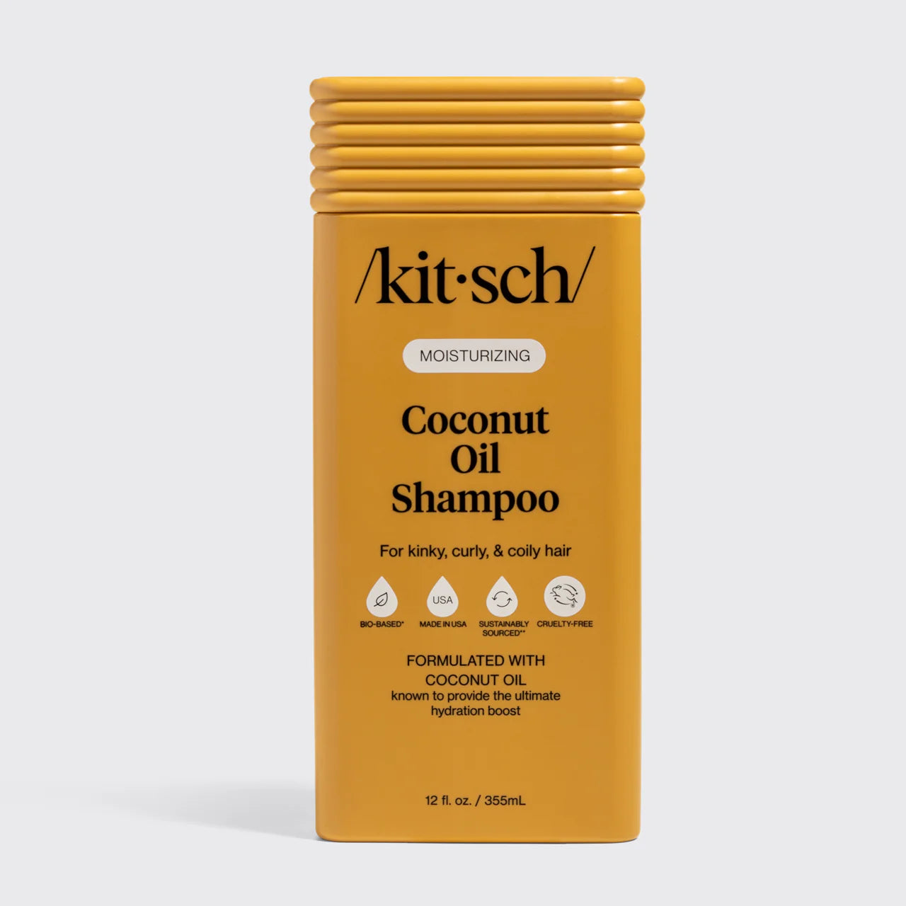 Kitsch Coconut Oil Shampoo bottle on a white background