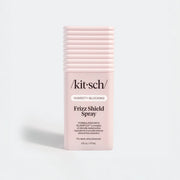 Kitsch Frizz Shield Spray bottle on a light gray background