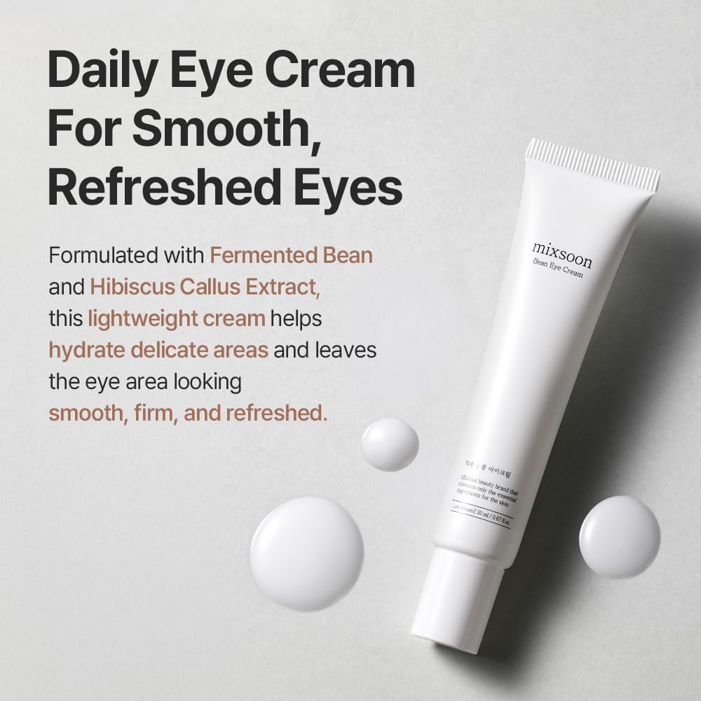 mixsoon bean eye cream for smooth, refreshed eyes, white minimalist tube on a an off white background with dot swatches of the cream
