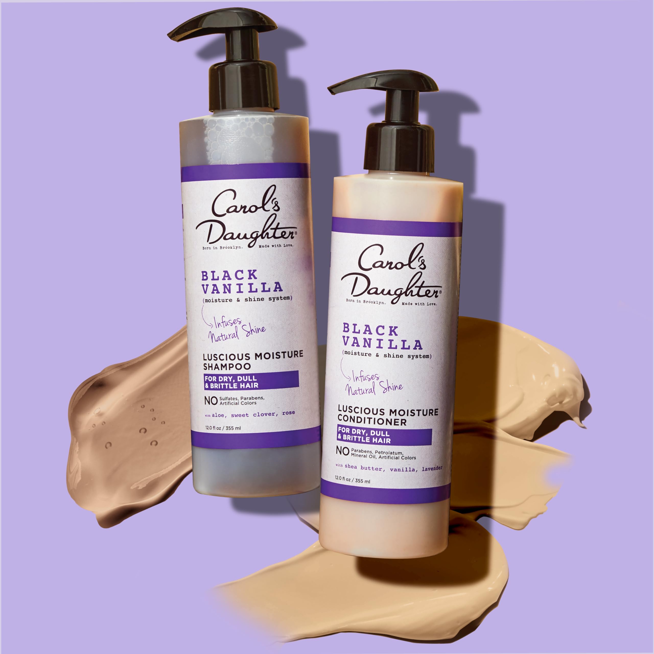 carols daughter shampoo and conditioner on purple background with goop