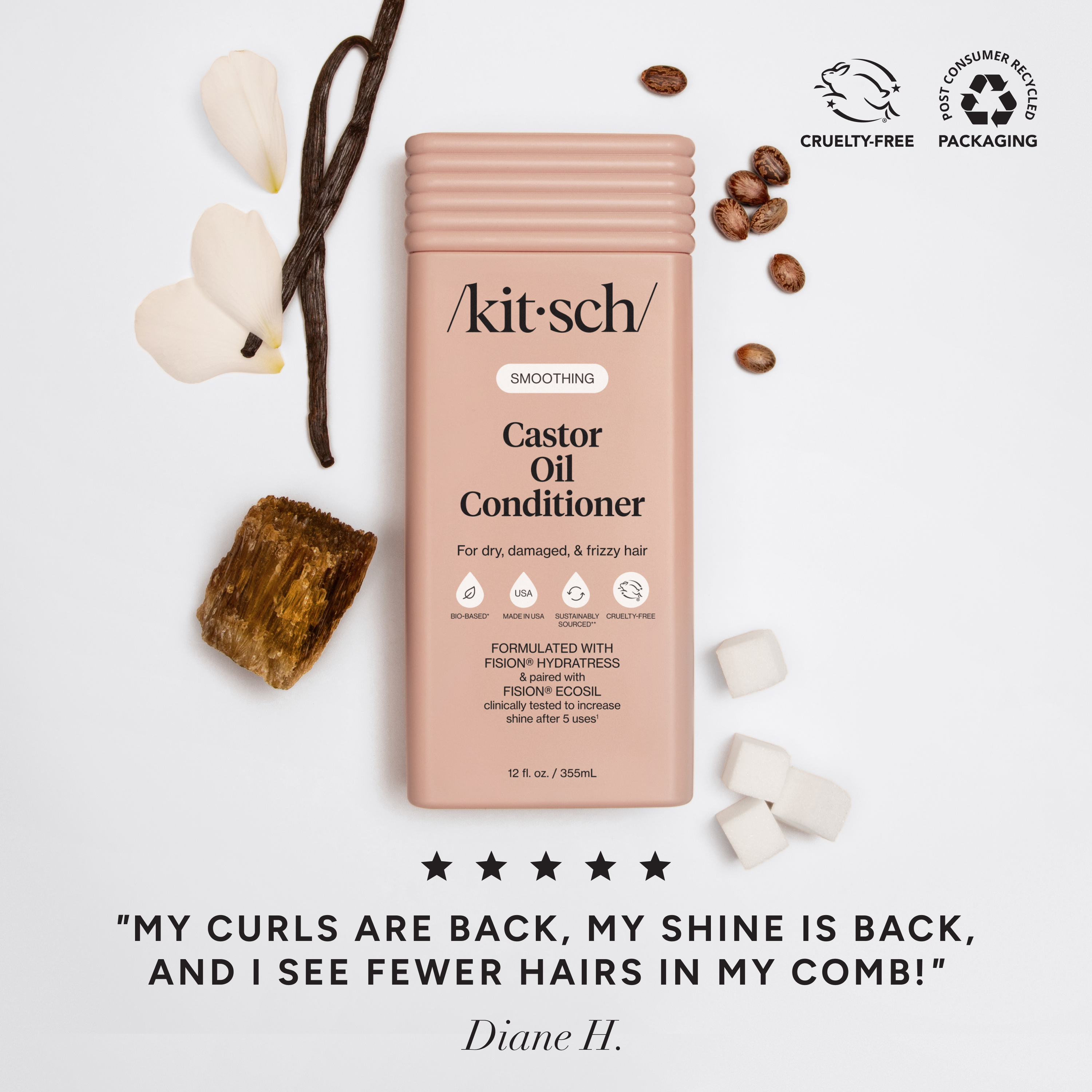 Kitsch Castor Oil Conditioner bottle with vanilla beans, coconut, and coffee beans on a light background