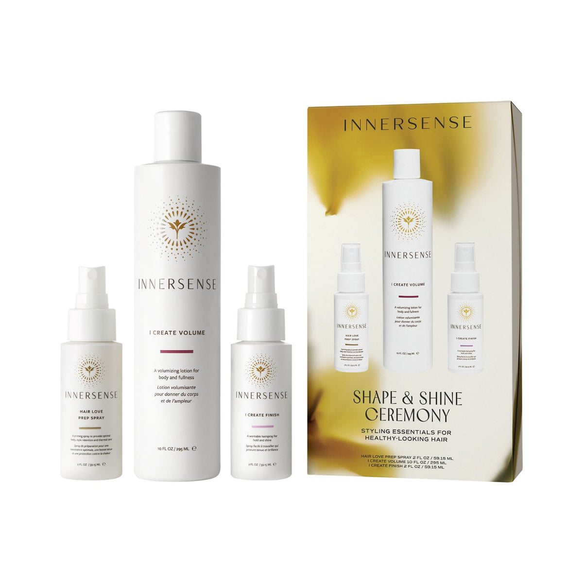 Innersense styling essentials set including a tall bottle labeled 'I Create Volume', two smaller spray bottles, and a gold-and-white product box, all on a clean white background.