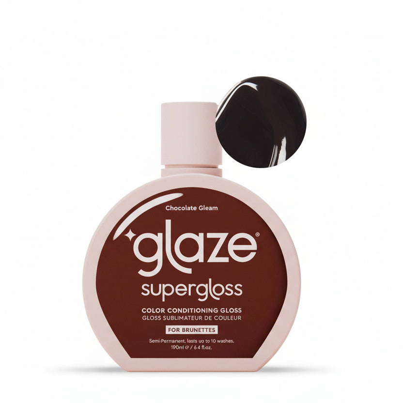 Glaze supergloss bottle with a swatch of black color on a light pink background