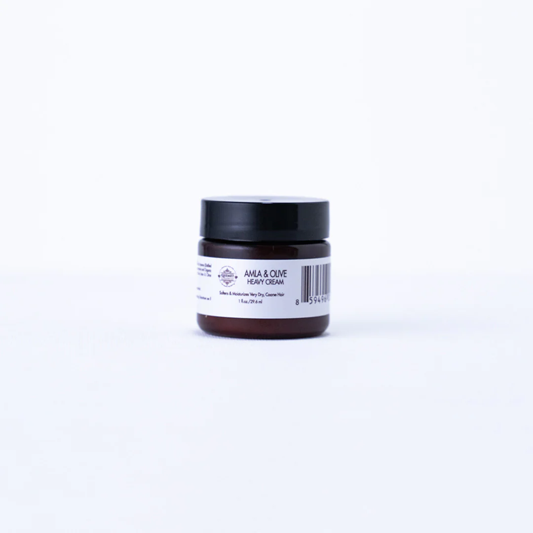 A mini jar of amla heavy cream 