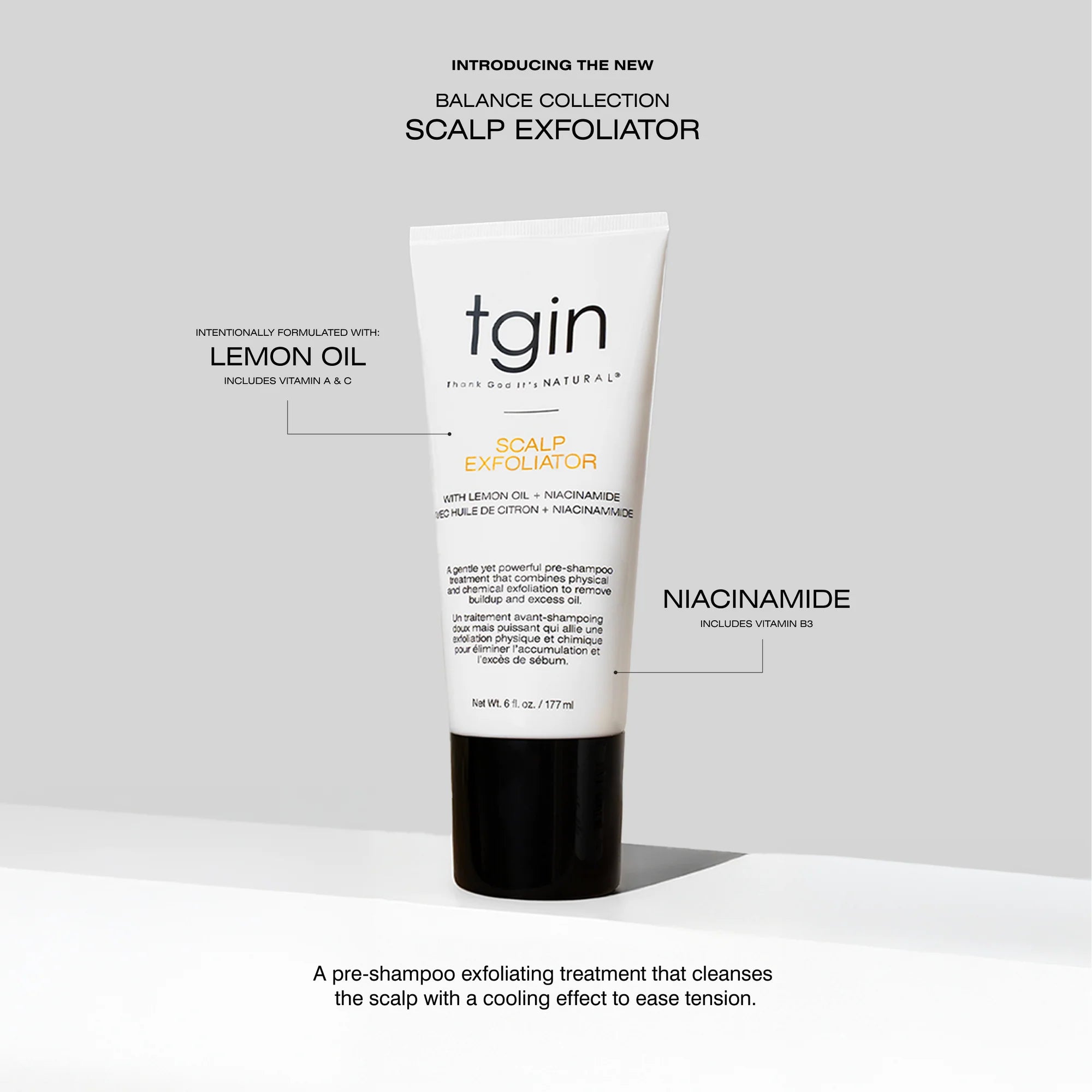 tgin scalp exfoliator tube on a light gray background