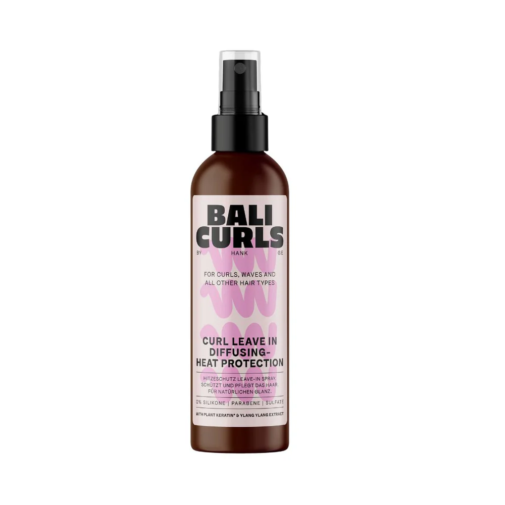 A bottle of Bali Curls Curl Leave-In Diffusing Heat Protection Spray.