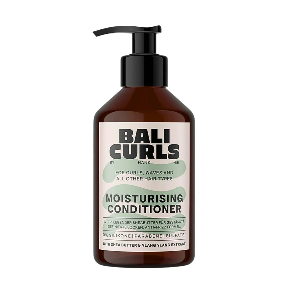 A bottle of Bali Curls Moisturising Conditioner with a pump dispenser, labeled for curls, waves, and all hair types.