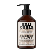 A bottle of Bali Curls Nourishing Shampoo with a pump dispenser, showcasing the product label which includes the name and the phrase 'FOR CURLS WAVES & ALL OTHER HAIR TYPES'.