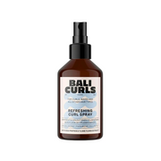 A bottle of Bali Curls Refreshing Curl Spray with a black spray nozzle, labeled for curls, waves, and all hair types.