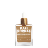 Bottle of Bali Bronze bronzing drops with a brown swatch on a white background
