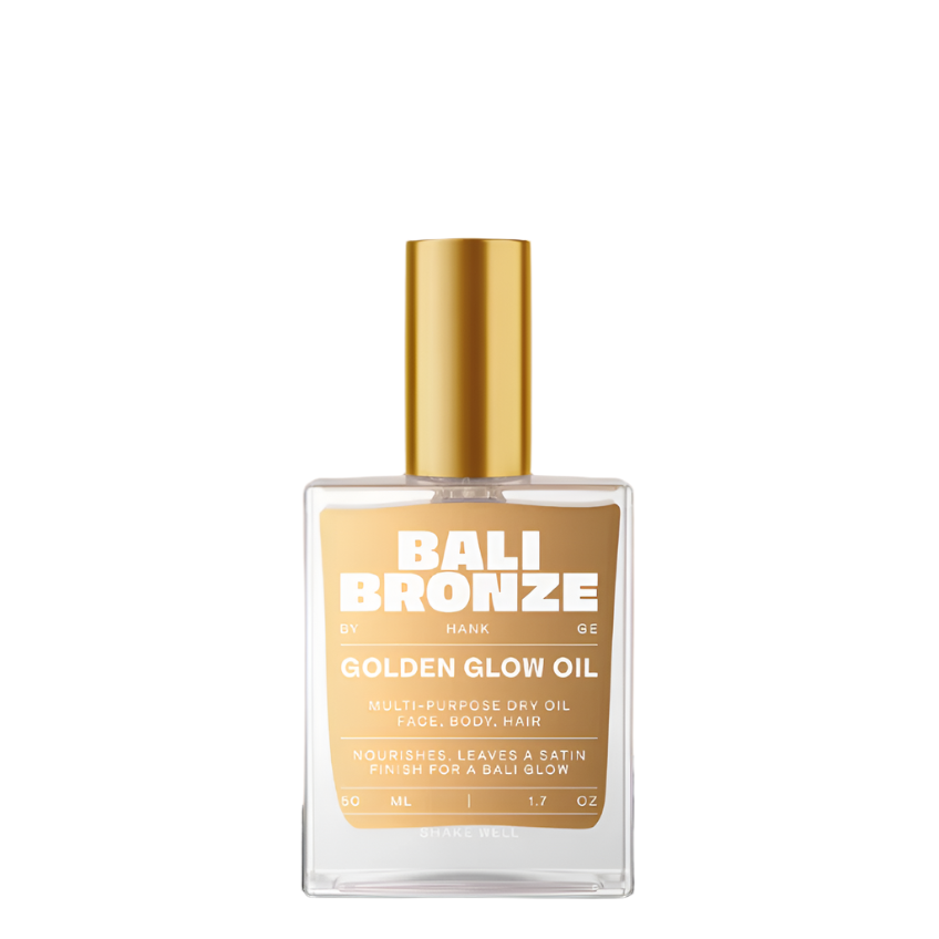 Bottle of Bali Bronze Golden Glow Oil with a gold cap on a white background