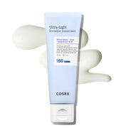COSRX ultra light invisible sunscreen spf50 pa++++ 50ml light blue tube with white lid cream swatch on a clean white background