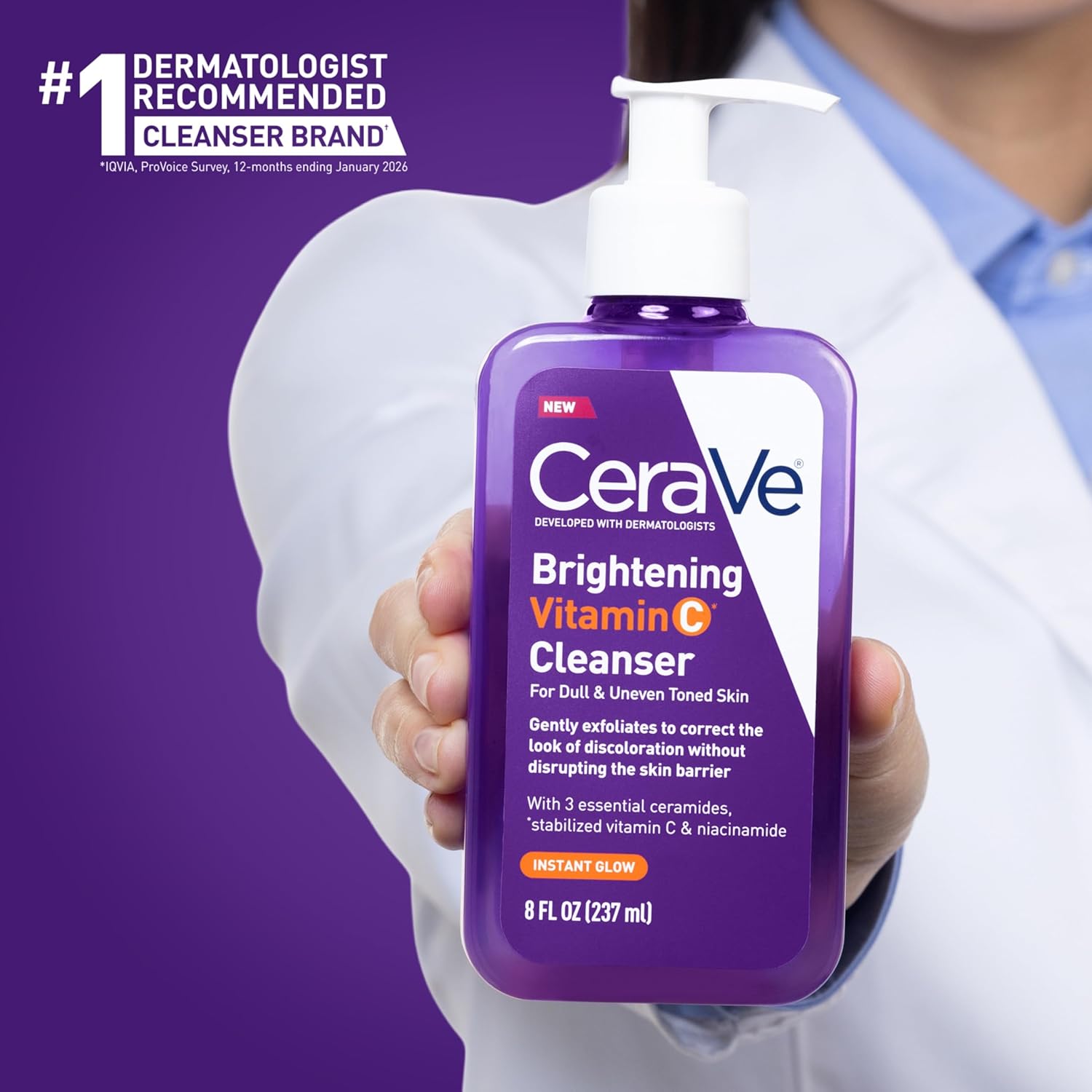 Dermatologist holding CeraVe Brightening Vitamin C Cleanser 236ml, a facial cleanser formulated to brighten dull skin and support the skin barrier.