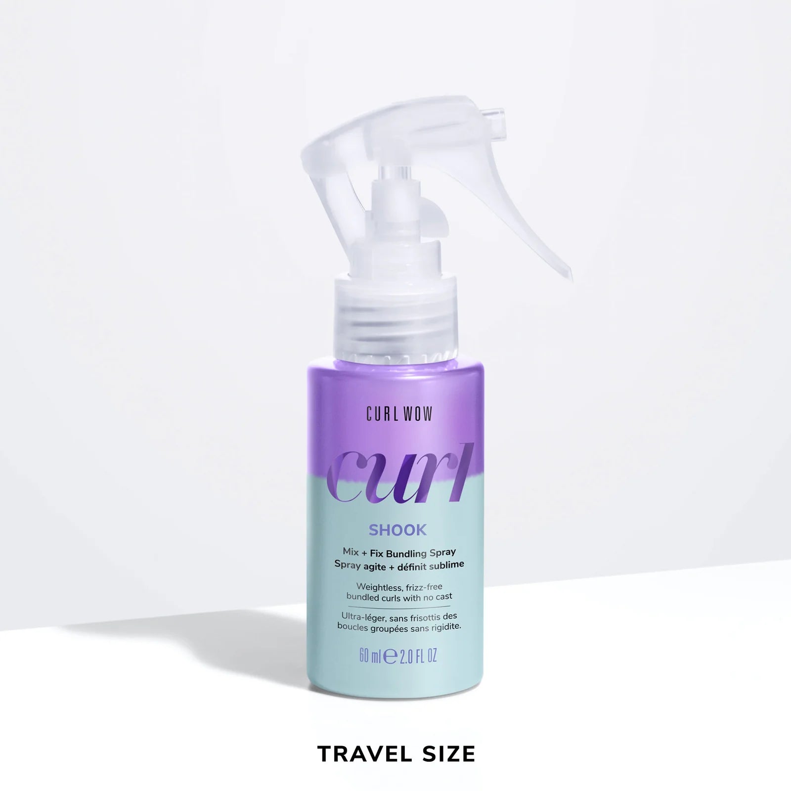 Color Wow Curl Wow Shook Mix + Fix Bundling Spray Travel Size 60ml spray bottle on a white background, lightweight curl styling spray that hydrates, reduces frizz, defines curl bundles, and delivers flexible hold without stiffness.
