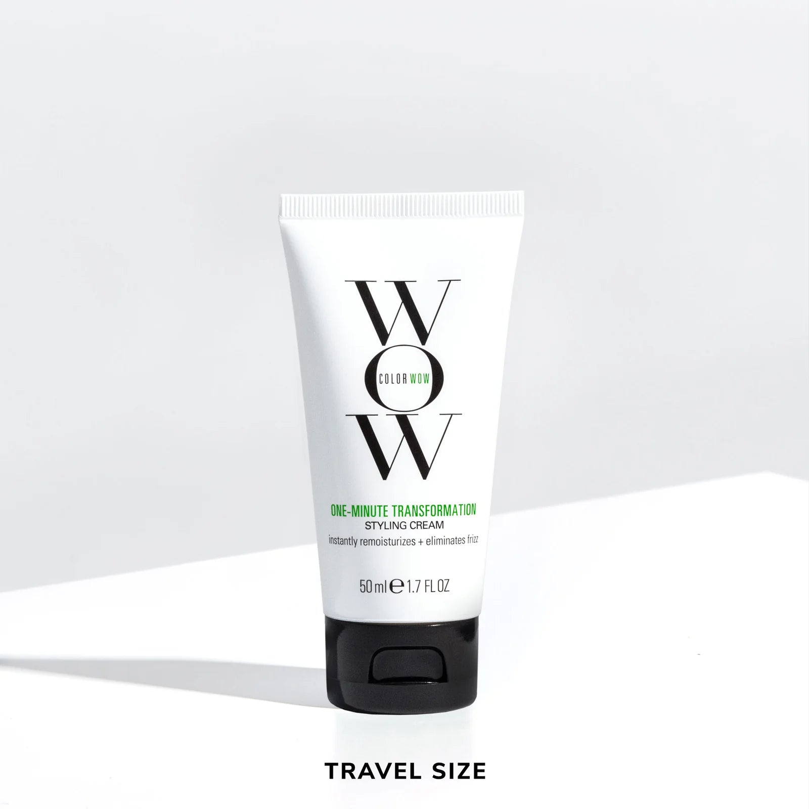 Color Wow One-Minute Transformation Styling Cream Travel Size 50ml tube on a white background, lightweight styling cream that instantly rehydrates dry hair, smooths frizz and flyaways, and refreshes second-day styles for a polished finish.