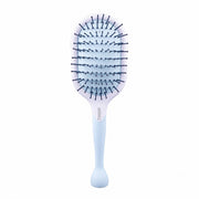 Cricket Friction Free Paddle Brush ceramic-coated barrel for better heat retention and drying time, designed with comfort, performance and results in mind