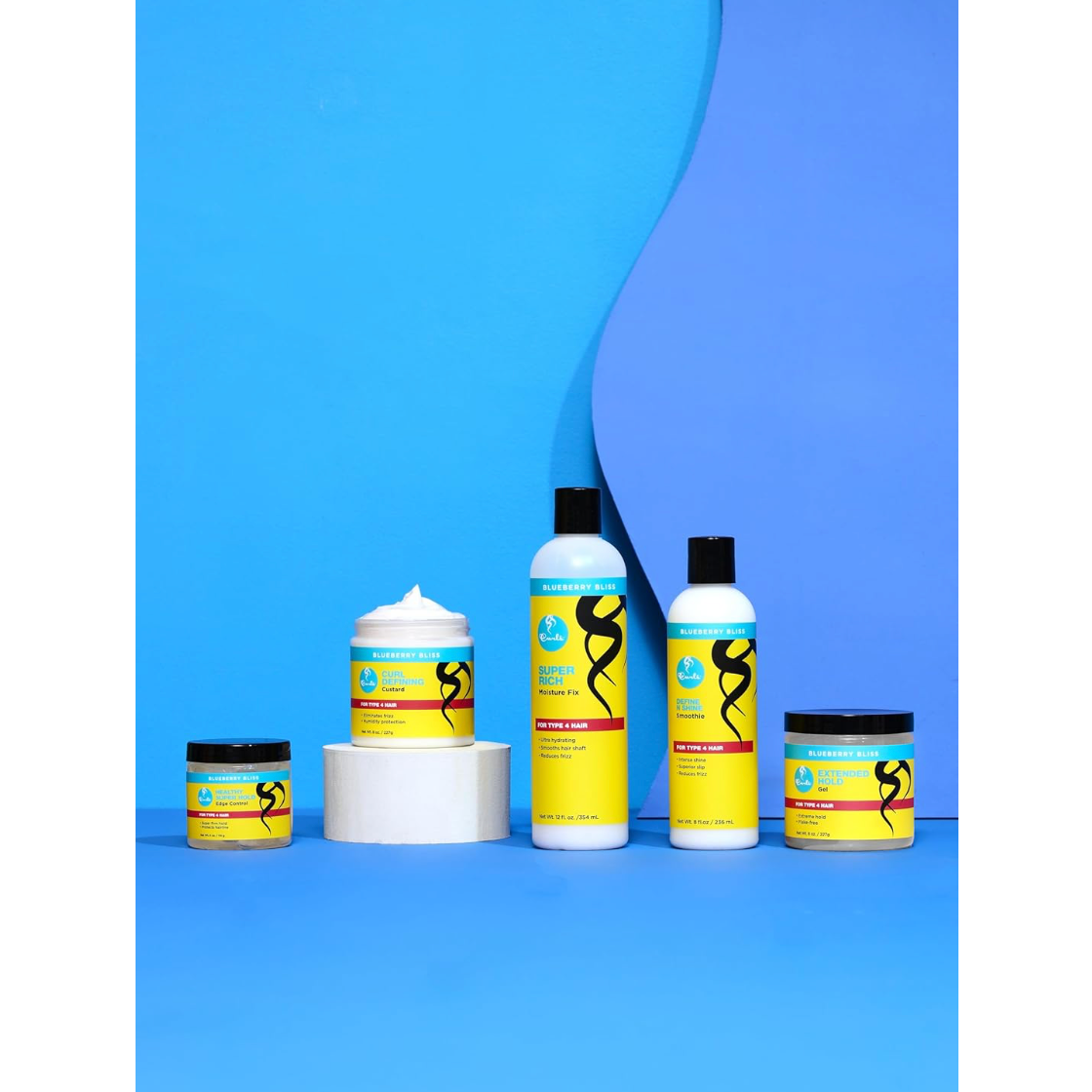 Curls Blueberry Bliss hair care collection featuring Define N Shine Smoothie, Super Rich Moisture Fix, Curl Control Paste, Curling Custard and Extended Hold Gel.
