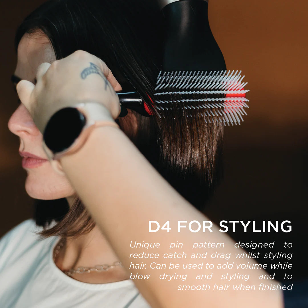 Denman D4 Original Styler 9-Row Brush used during blow-drying to smooth hair, reduce snagging and add volume.