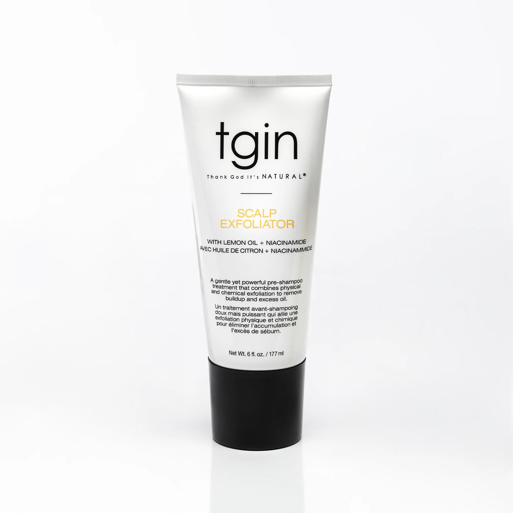 A tube of tgin Scalp Exfoliator with Lemon Oil and Nanonamide, featuring a white tube with black and gold text and a black cap, set against a plain white background.