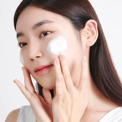 Etude House SoonJung pH 6.5 Whip Cleanser 250ml female applying product to face