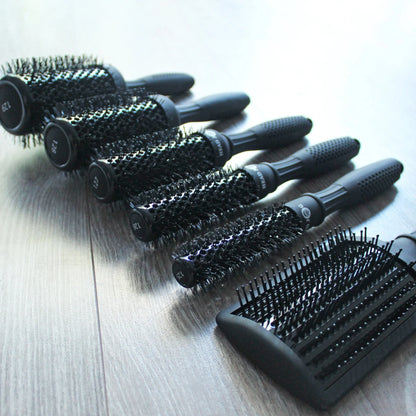 Head Jog Light professional hair brush collection featuring ceramic radial brushes and paddle brush with lightweight ergonomic handles for salon styling.