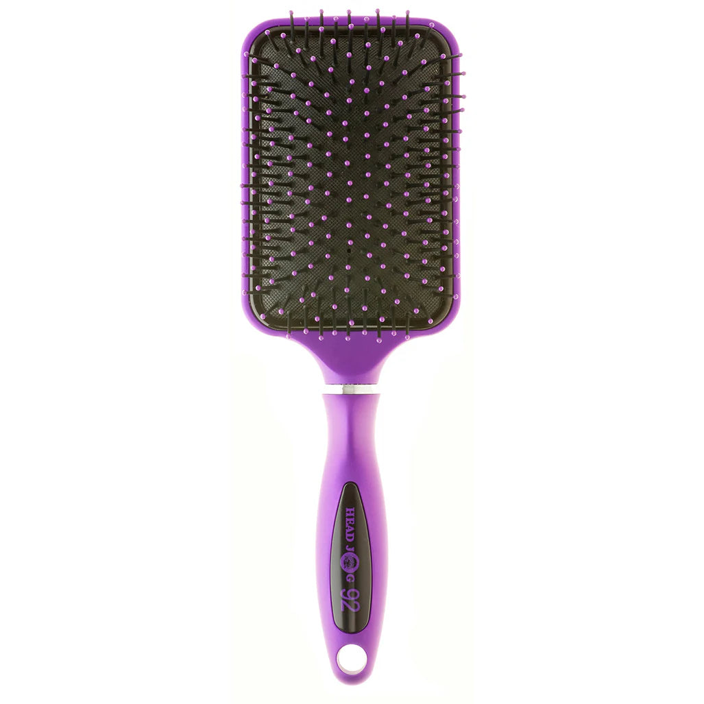 Head Jog 92 Paddle Brush with ceramic-coated base and ionic bristles work together to smooth the hair, reduce frizz, and leave strands soft, sleek, and full of shine.