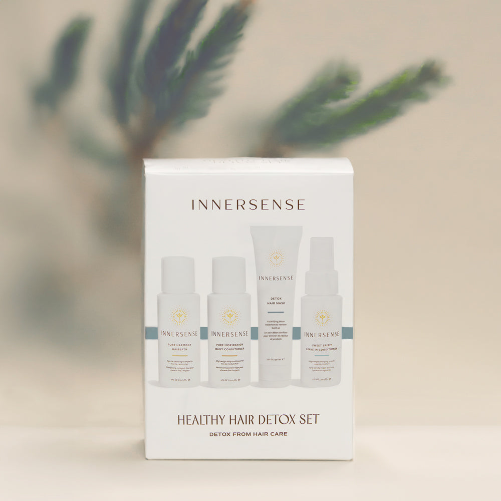 INNERSENSE Healthy Hair Detox Set packaging with bottles on a blurred natural background