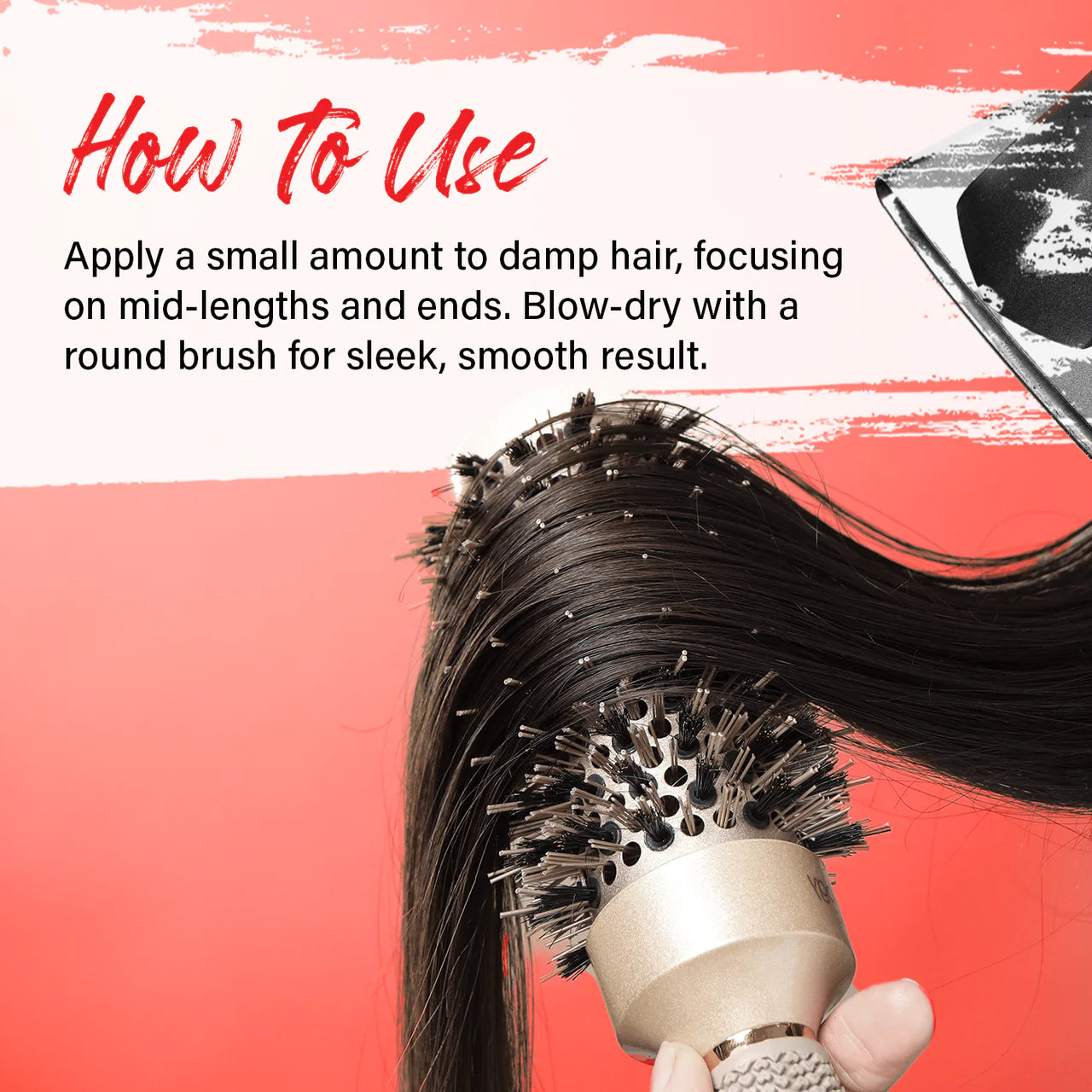 Applying heat protectant blow dry balm to damp hair before styling.