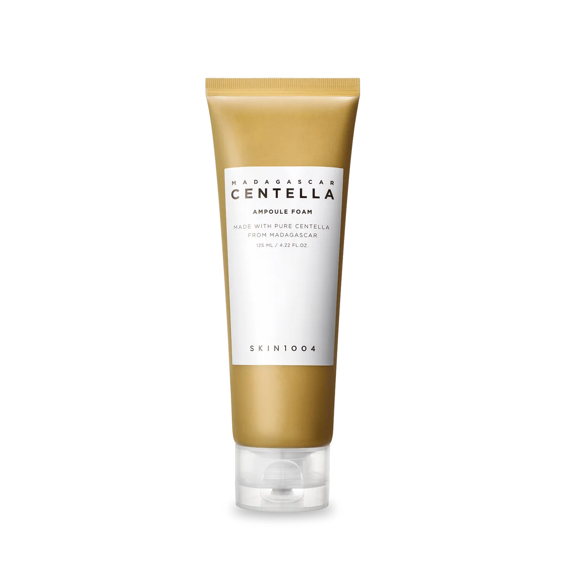 Skincare tube with gold and white design on a white background