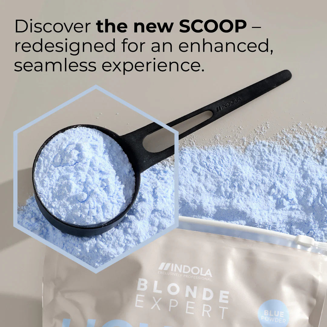 Indola Blonde Expert Lightener Up to 9+ Levels Of Lift Blue Powder zoom in on scoop with powder