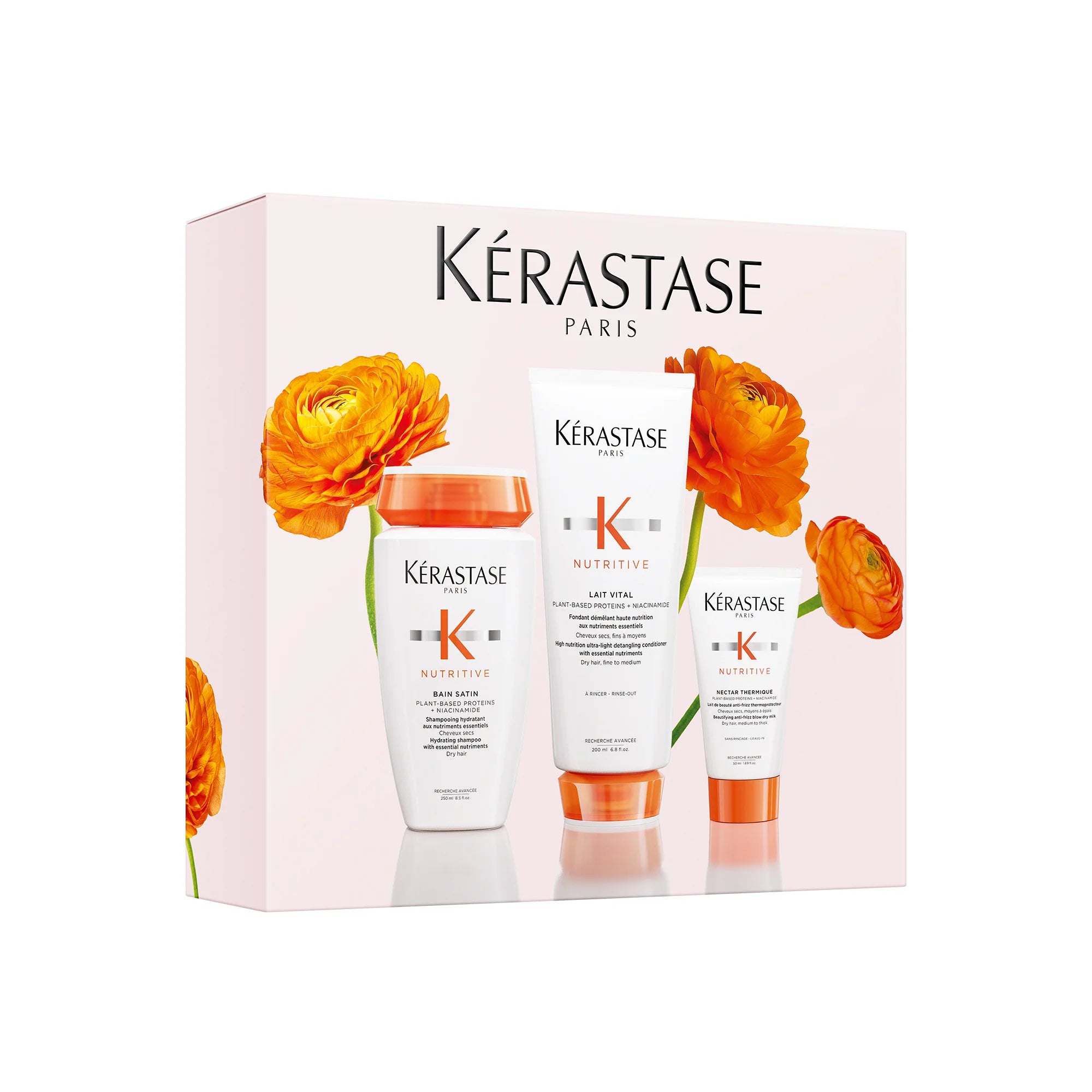 Kérastase Nutritive Spring Gift Set in a pale pink floral box with Bain Satin, Lait Vital and Nectar Thermique for nourishing dry hair.