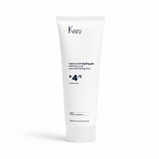 Kezy Curl Styling Gel 250ml in a white squeeze tube with 4/5 fixing level, isolated on a white background with a soft shadow, high-resolution e-commerce product image.