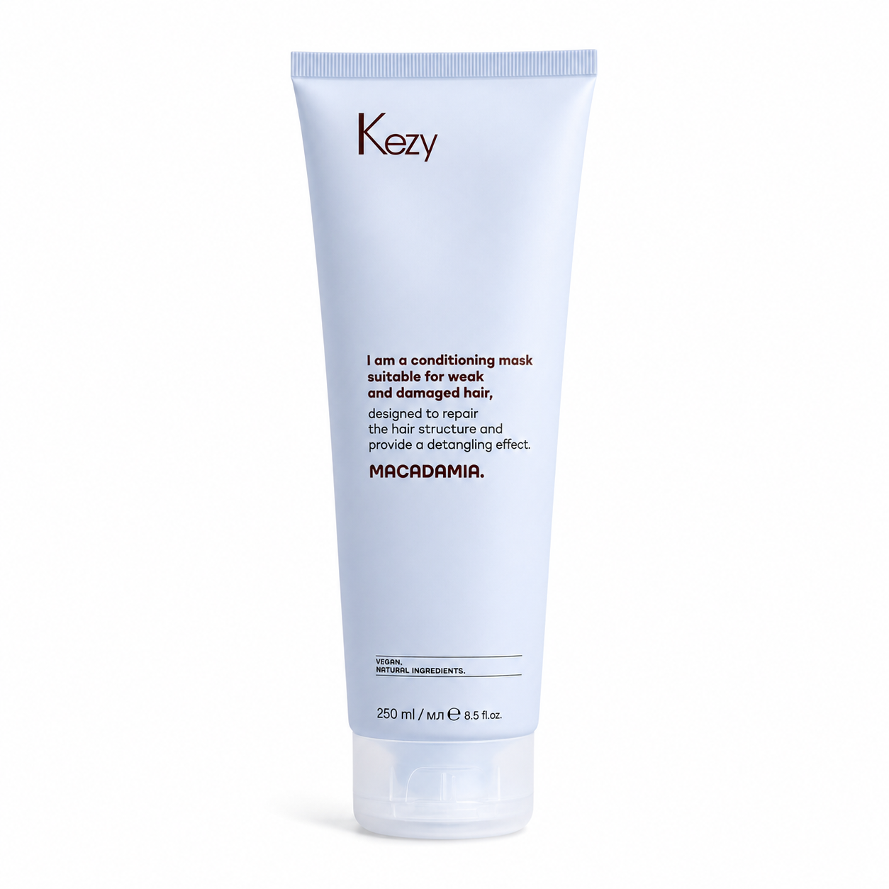 Kezy Macadamia Conditioning Mask 250ml for weak and damaged hair, professional vegan hair treatment mask designed to repair hair structure, improve manageability, and provide a detangling effect, light blue tube on a white background.