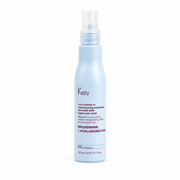 Kezy Macadamia and Hyaluronic Acid Leave-In Restructuring Treatment 150ml in a white spray bottle with a transparent pump, designed to help repair and reorganize damaged hair.