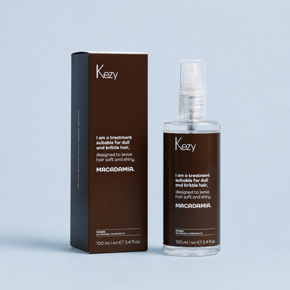 Kezy Macadamia Treatment Oil 100ml with box and bottle on a light blue background