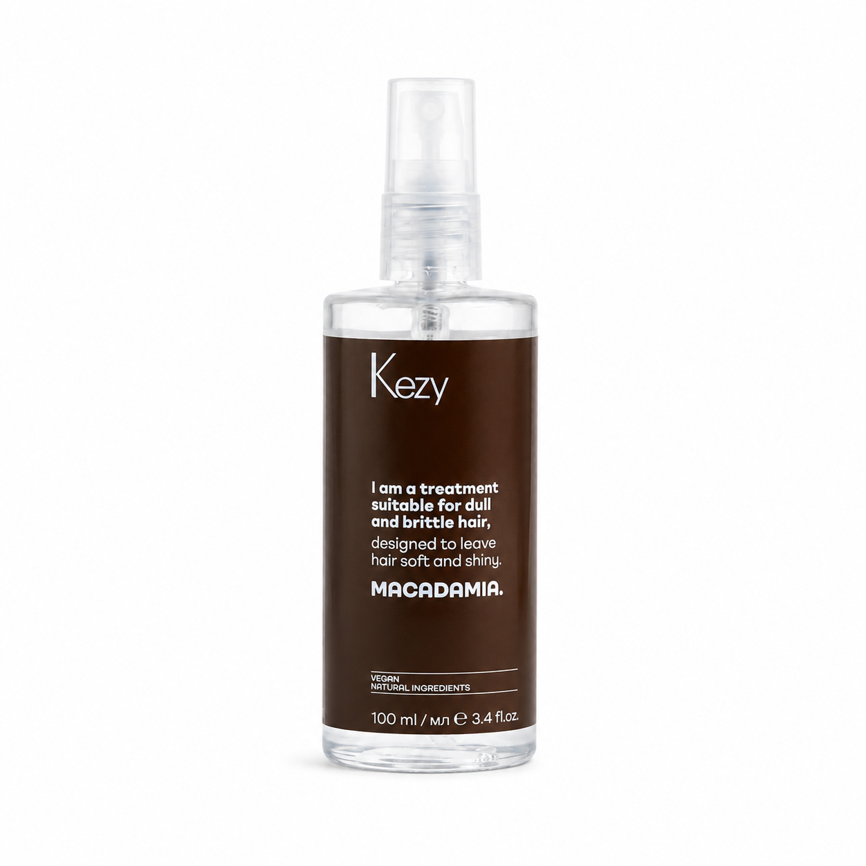 Kezy Macadamia Treatment Oil 100ml hair treatment in a clear bottle with a transparent pump dispenser, designed to leave hair soft, shiny and nourished.