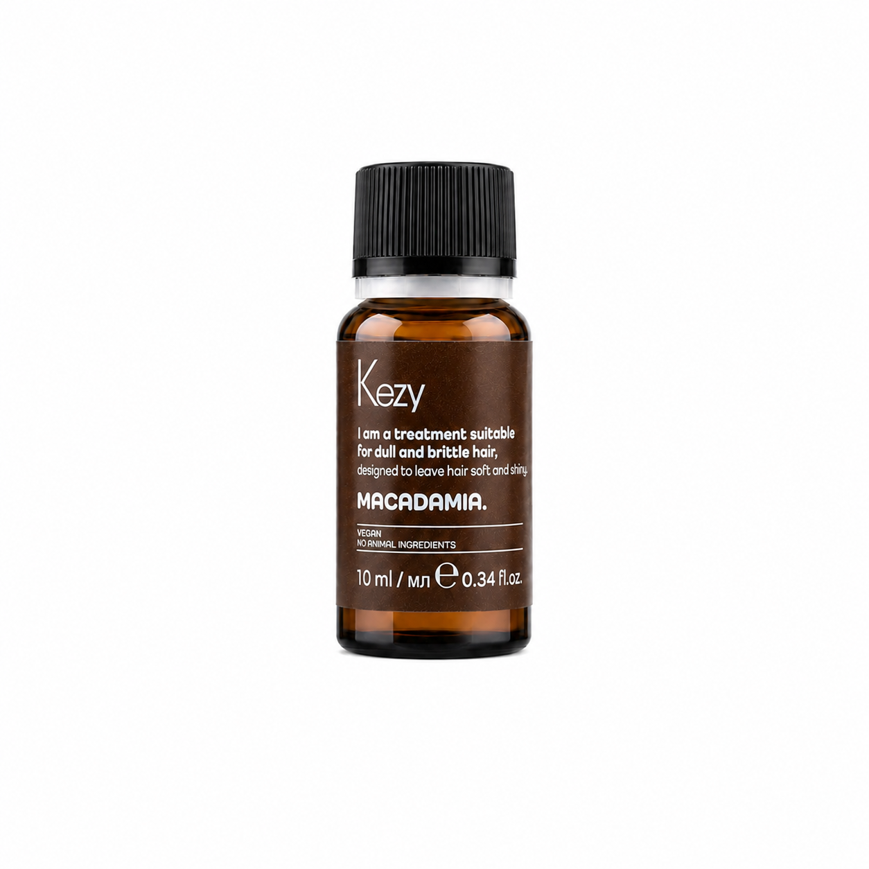 Kezy Macadamia Treatment Oil 10ml in an amber glass bottle with a black screw cap, formulated for dull and brittle hair, displayed on a soft white background.