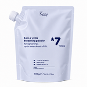 Kezy White Bleaching Powder 500g in a Blue refill pouch with a screw-cap spout, formulated to lighten hair up to seven levels of lift, presented on a soft white background.